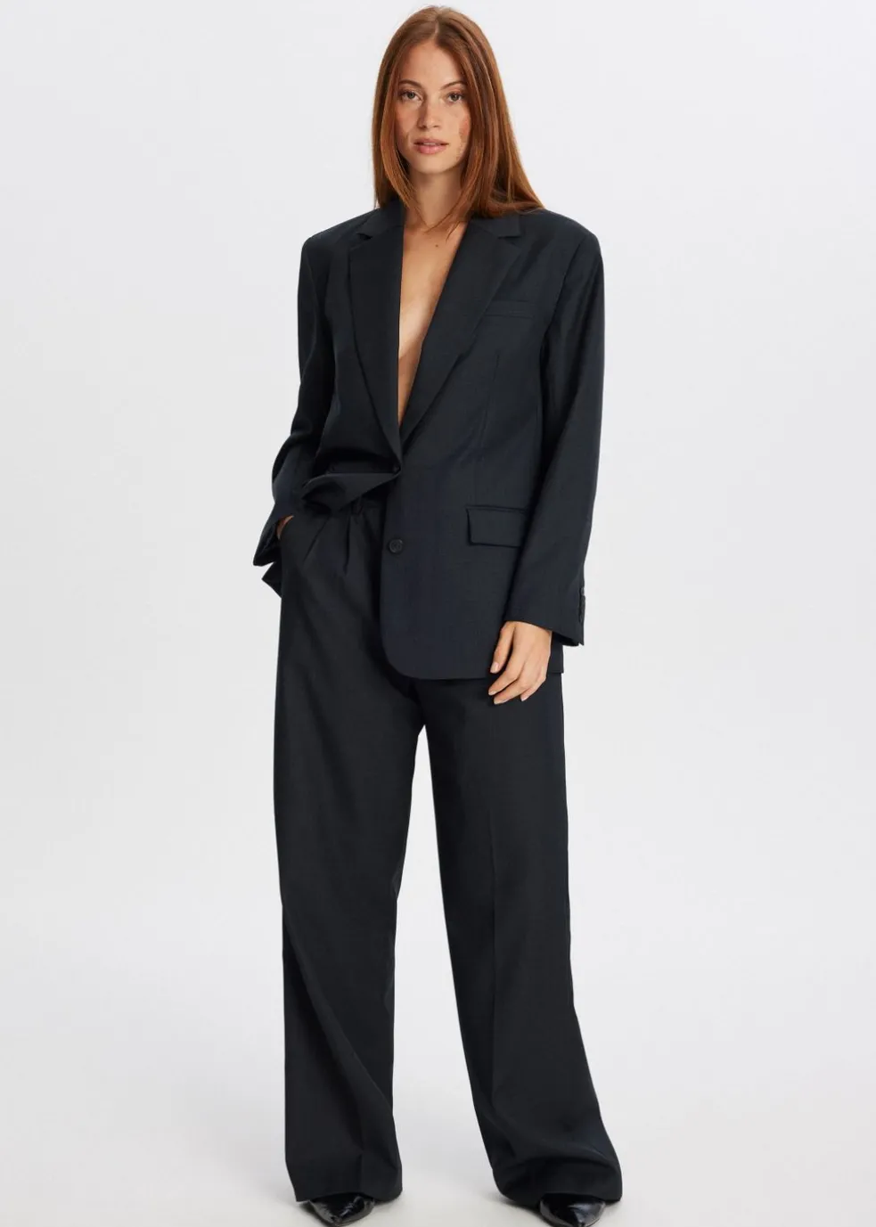 Broek met melange look