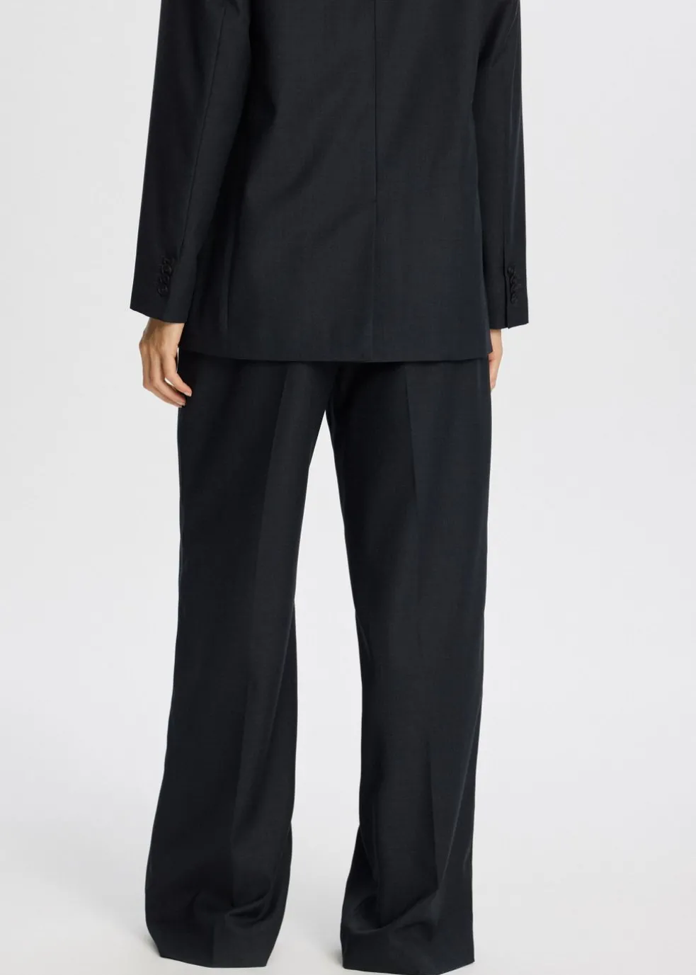 Broek met melange look