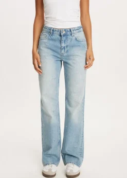 Jeans met geborduurde strikjes