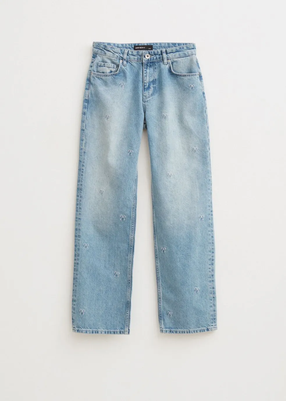 Jeans met geborduurde strikjes