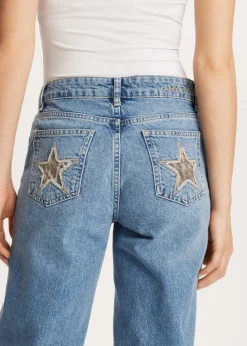 Jeans met sterren achterzakken