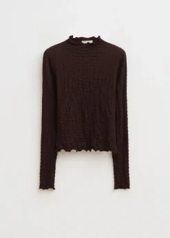 Top met strikdetail