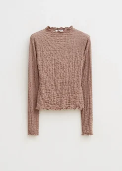 Top met strikdetail